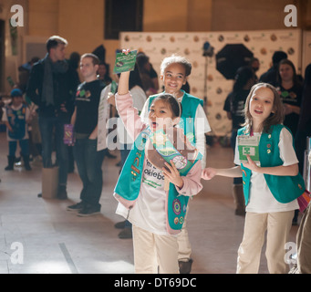 Girl Scouts mark the start of National Girl Scout Cookie Weekend in Vanderbilt Hall in Grand Central Terminal in New York Stock Photo