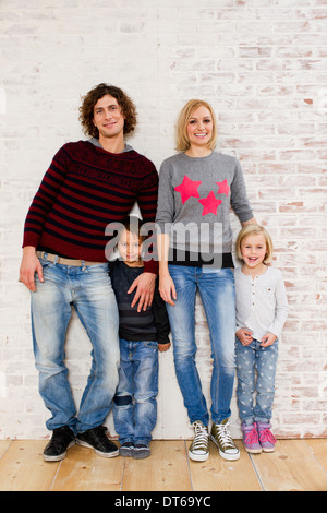 Studio portrait of couple with son and daughter Stock Photo