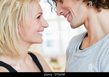 Cropped studio shot of smiling couple Stock Photo