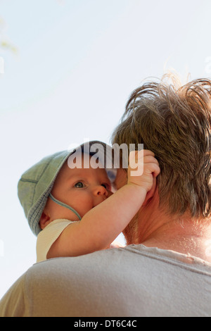 Father holding baby daughter Stock Photo