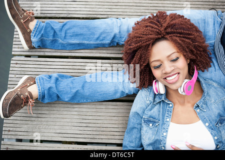 Young couple on jetty, overhead view Stock Photo