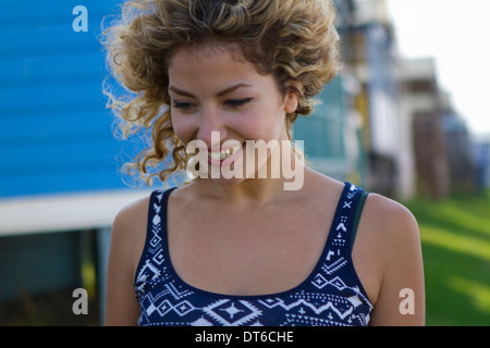 Portrait of young woman looking down Stock Photo