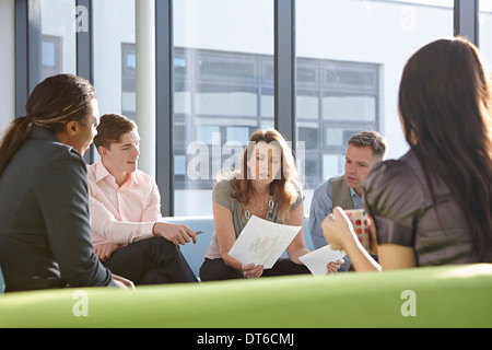 Portrait of business colleagues in meeting Stock Photo