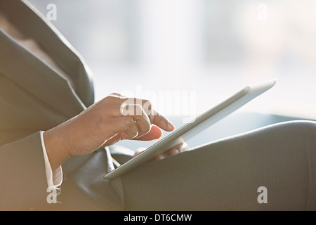 Businesswoman using digital tablet, close up Stock Photo