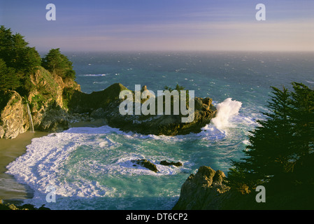 The coastline and a horseshoe bay with waves crashing against the rocks in Julia Pfeiffer Burns State Park.