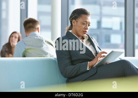 Businesswoman using digital tablet Stock Photo