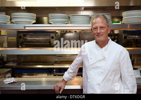 Chef in kitchen Stock Photo