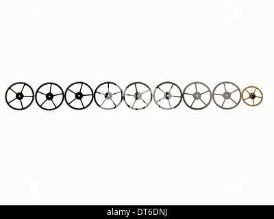 Watch gears, small precision made cog wheels with spokes and fine teeth or notches around the edge. Arranged in a neat row. Stock Photo