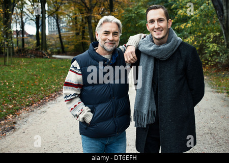 Nude male posing in tree Stock Photo - Alamy