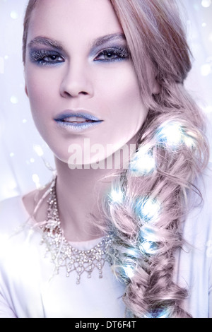 Portrait of woman in frosty make-up Stock Photo