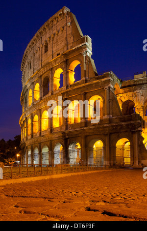 Cobblestones lead to the Roman Coliseum, Rome, Lazio, Italy Stock Photo