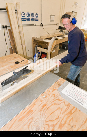 Man working in carpentry / woodwork workshop Stock Photo