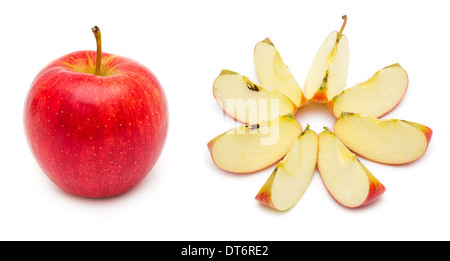 Whole and sliced red apple, showing pips, and core. Isolated on white background. Stock Photo