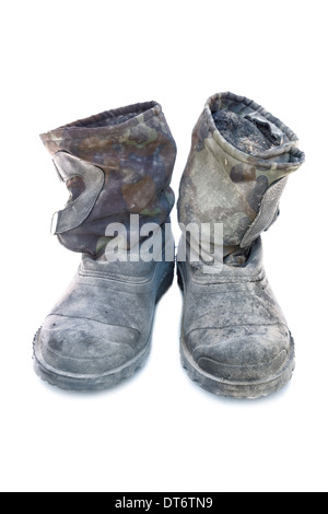 Pair of Old Dirty Working Boots isolated Stock Photo