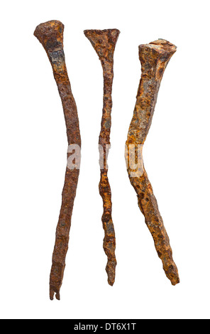 Old handforged rusty nails isolated on white background Stock Photo