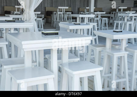 white stools and tables in the beach bar Stock Photo