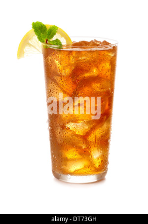 A cold glass of iced tea with a lemon wedge garnish and a sprig of mint in a clear glass with icecubes Stock Photo