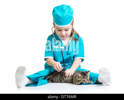 Child girl playing doctor with cat kitten Stock Photo