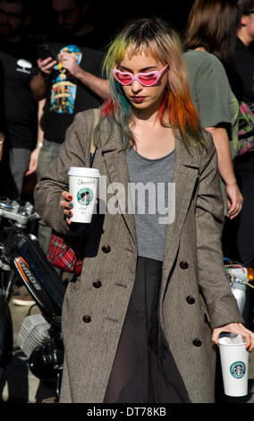 Los Angeles, California, USA. 10th February 2014. Dumb Starbucks in Los Angeles California draws a crowd for free coffee. Credit:  Robert Landau/Alamy Live News