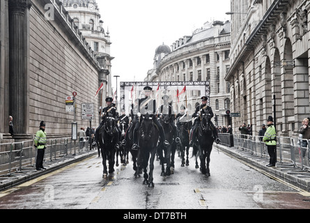 Documenting the 68 Signals Squadron riding through the streets of London for 2010 Lord Mayor's Show. Stock Photo