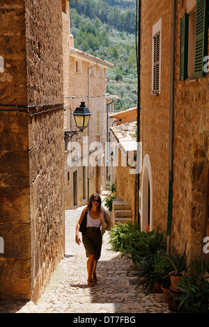 Woman walking in Fornalutx, Majorca Stock Photo