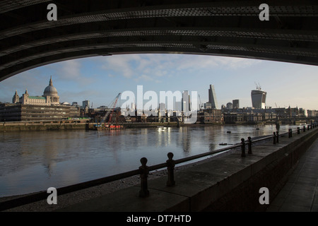 The London skyline and St Paul's Cathedral viewed from beneath Blackfriars Bridge. Stock Photo