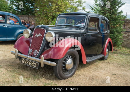 WINDSOR, BERKSHIRE, UK- Augsut 4, 2013: 1936 Black and red Austin Ten Classic car on show at Windsor Farm Shop International Cla Stock Photo