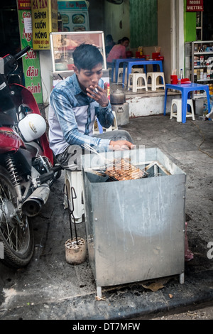 ethnic Vietnamese old man smoking his pipe in Ta Phin, Lao Cai in Sapa ...