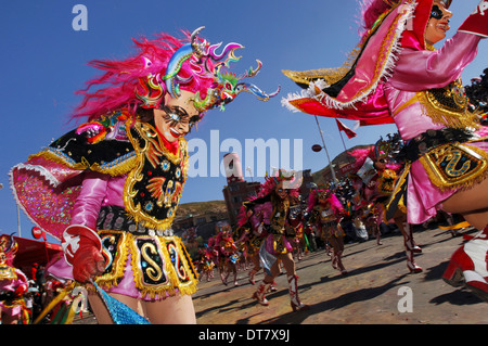 Participants diablada dancing, dance that represents fighting between the forces of good and evil Stock Photo