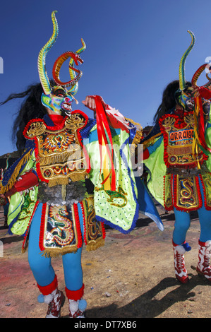 Participants diablada dancing, dance that represents fighting between the forces of good and evil Stock Photo