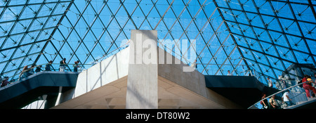 Louvre. Access under the pyramidal dome. Stock Photo