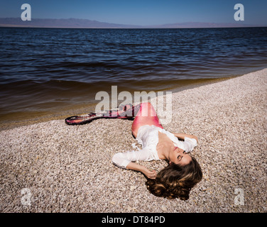 Mermaid on the Salton Sea beach in the afternoon, California Stock Photo