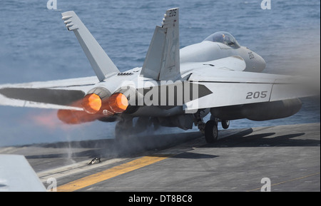 Arabian Gulf, July 4, 2013 - An F/A-18E Super Hornet launches from the aircraft carrier USS Nimitz. Stock Photo