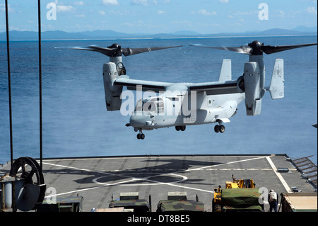 An MV-22 Osprey lands on the flight deck of USS Germantown. Stock Photo