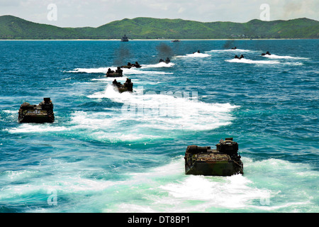 Amphibious assault vehicles approach Hat Yao beach, Thailand. Stock Photo