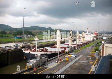 The Miraflores Locks on the Panama Canal are an engineer marvel, allowing giant ships to pass from Pacific to Atlantic oceans. Stock Photo
