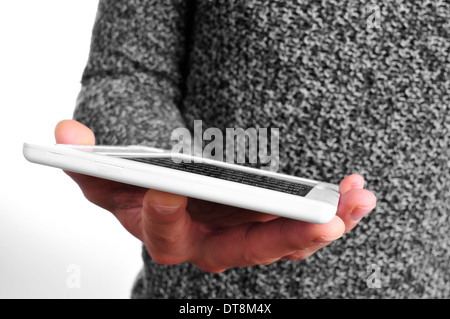 a man in casual wear using an e-book reader Stock Photo