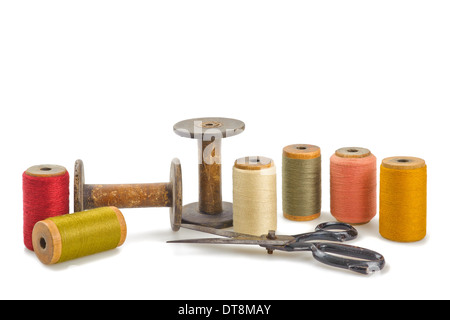 Scissors and spools isolated on white Stock Photo