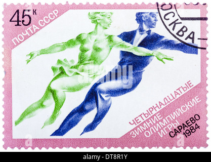 Postage stamps printed in the USSR, shows the XIV Olympic Winter Games in Sarajevo, Figure skating Stock Photo