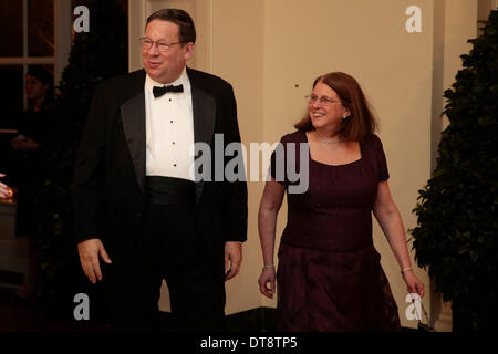 Washington DC, USA. 11th Feb, 2014.David Cohen, chairman of the University of Pennsylvania and former executive vice president of Comcast Corp., left, and Rhonda Cohen arrive to a state dinner hosted by U.S. President Barack Obama and U.S. First Lady Michelle Obama in honor of French President Francois Hollande at the White House in Washington, USA, 11 February 2014. Obama and Hollande said the U.S. and France are embarking on a new, elevated level of cooperation as they confront global security threats in Syria and Iran, deal with climate change and expand economic cooperation. Credit: Andrew Stock Photo