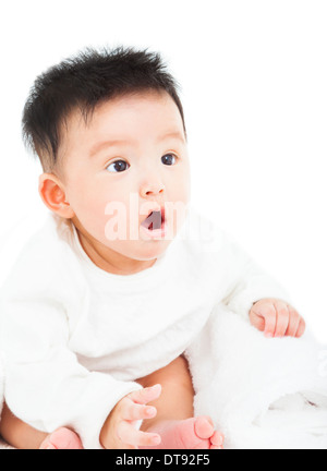 cute baby making a funny surprised face with towel over white Stock Photo