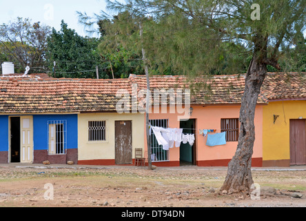 Street of brightly painted houses, Trinidad, Cuba Stock Photo