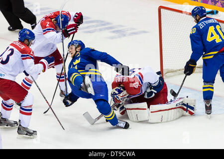 Sochi, Krasnodar Krai, Russia. 12th Feb, 2014. Sweden's Gabriel LANDESKOG finds himself upended during the Men's Ice Hockey preliminary round between Sweden and the Czech Republic at the Bolshoy Ice Dome, Coastal Cluster - XXII Olympic Winter Games Credit:  Action Plus Sports/Alamy Live News Stock Photo