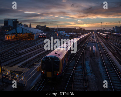 Dusk at Clapham Junction railway station Stock Photo