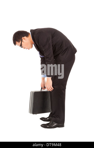 listless businessman stoop and holding briefcase over white Stock Photo