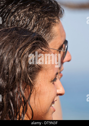 Shallow focus image of a wet young couple on vacation Stock Photo