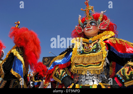 Participants diablada dancing, dance that represents fighting between the forces of good and evil Stock Photo