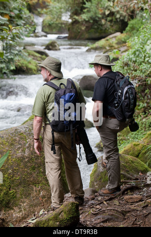 Eco-tourist Photographers. Savegre River. Rainforest. Talamanea Mountains. Costa Rica. Central America. Stock Photo