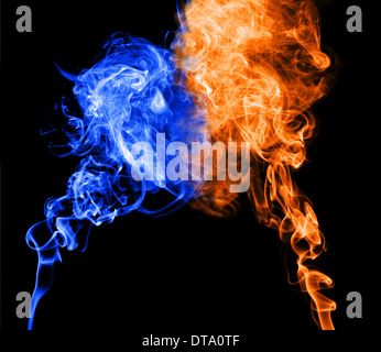 Abstract blue and red smoke puff join into heart shape, symbol of cold and warm character of love. Stock Photo