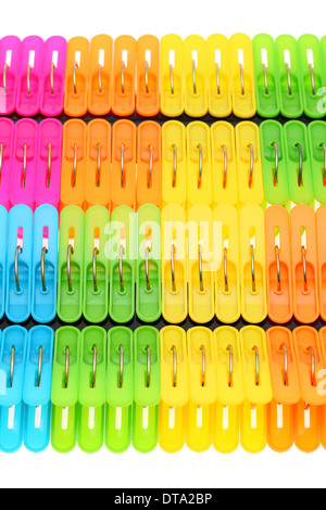 colorful plastic clothespins on white background Stock Photo